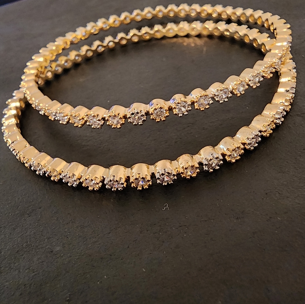 Silver and gold color stone imitation bangle in size 2.5.